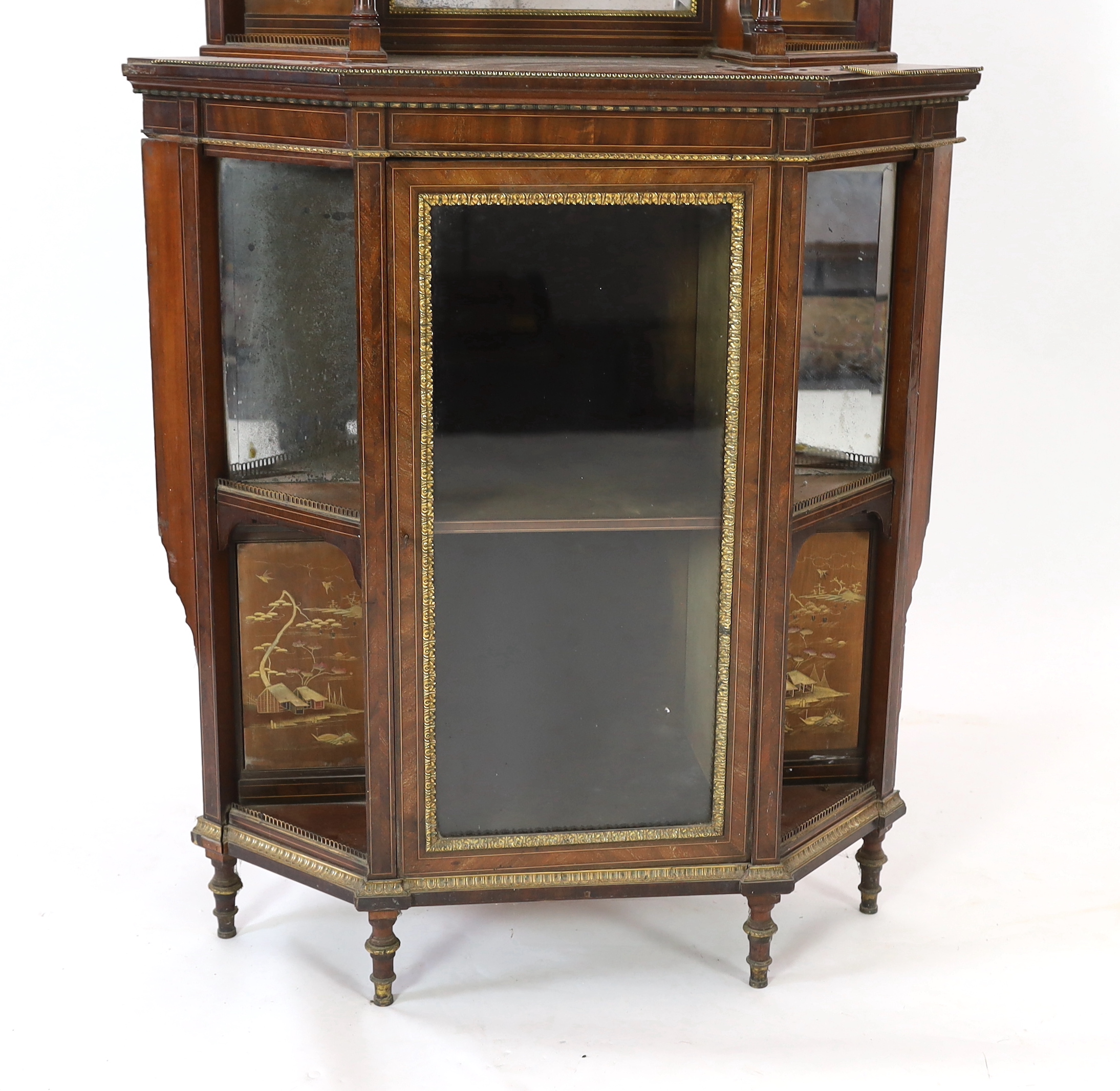 An unusual Anglo-Japanese inlaid mahogany standing corner cabinet, by Holland & Sons, c.1880, width 98cm, height 258cm